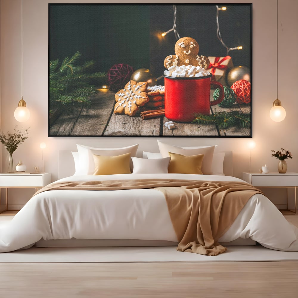 Tablou canvas cu tablou canvas cu turta dulce si cana rosie, in rama de aluminiu negru, pe perete intr-un dormitor
